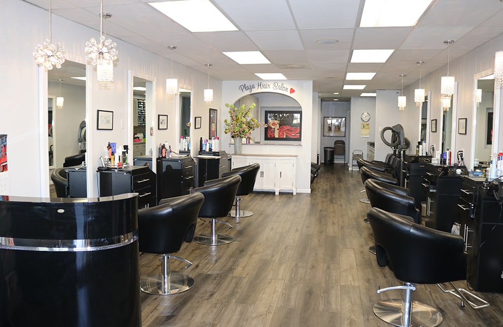 Premium Photo  Hairdresser sealing a strand of dyed hair in foil